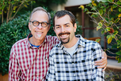 two men smiling